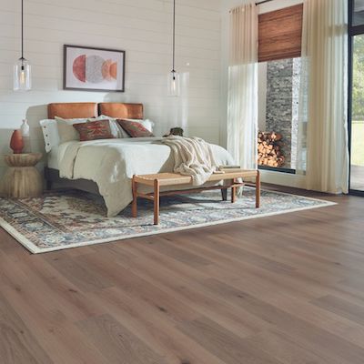 wood look laminate flooring in a bright bedroom